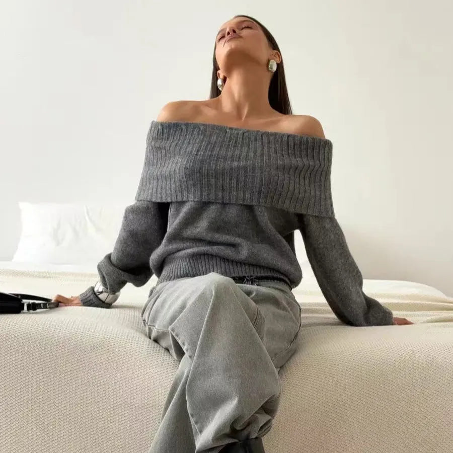Grey off-the-shoulder strapless pullover sweater with a 3D pattern texture.
