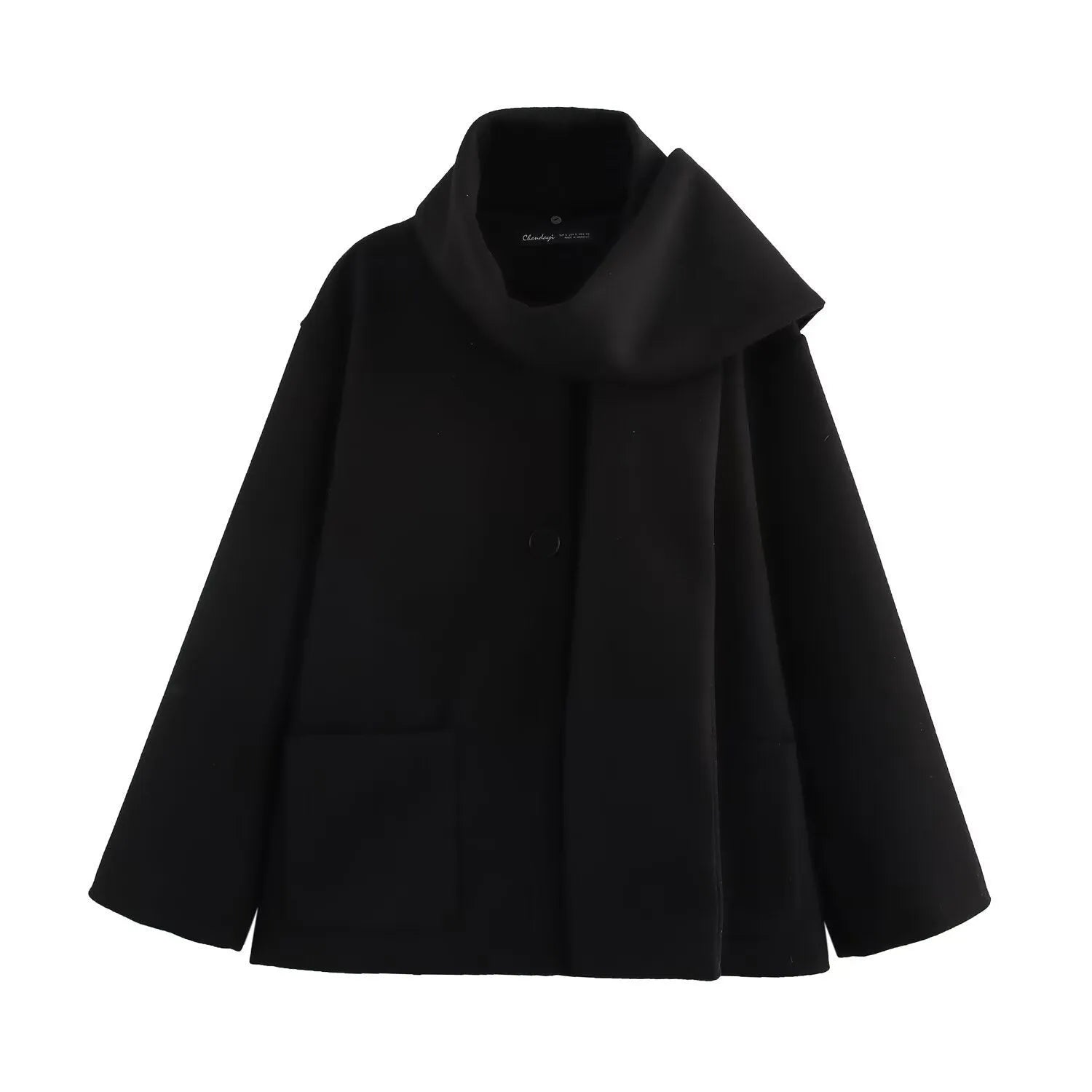 Women's long black polyester overcoat with artificial fur collar and pockets, showing extended length.