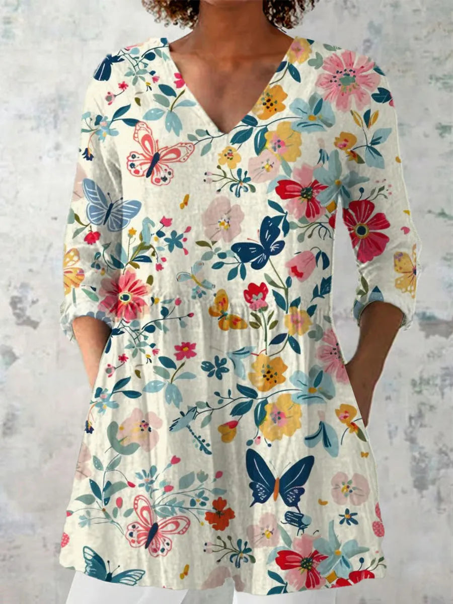 Women's retro slim fit printed long-sleeved polyester top on a hanger, showing digital print detail.