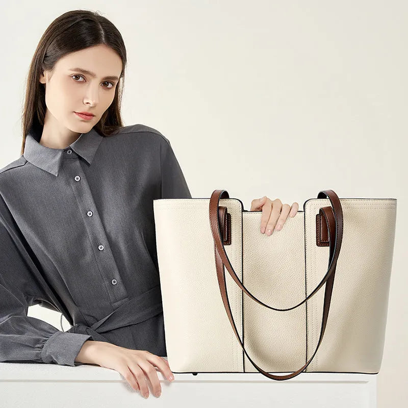 Women's black genuine leather crossbody shoulder bag with multiple internal compartments and a single strap