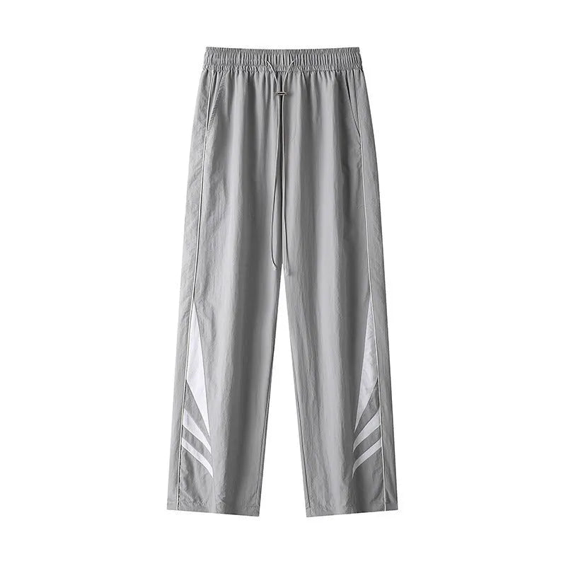 Men's straight leg casual trousers in grey with elastic waistband and button fly