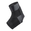 Black Lycra ankle support protector worn on an adult foot.