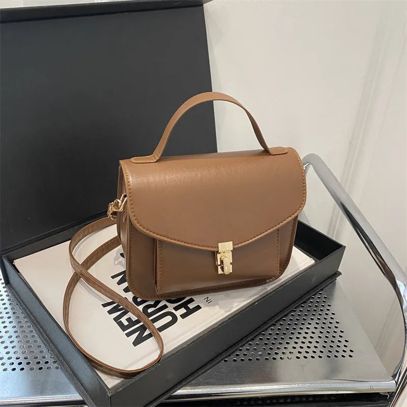 Retro style horizontal square messenger bag in PU material with sandwich pocket exterior