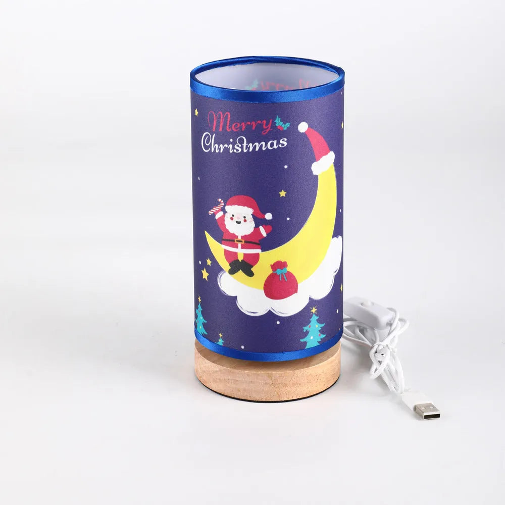 Moon-shaped Santa Claus LED night light with a bamboo base and a white USB plug.