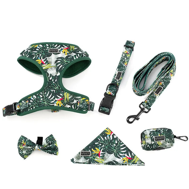 Six-piece adjustable dog harness set showing vest harness, lead, collar, poop bag holder, bow tie, and bandana in coordinating colours