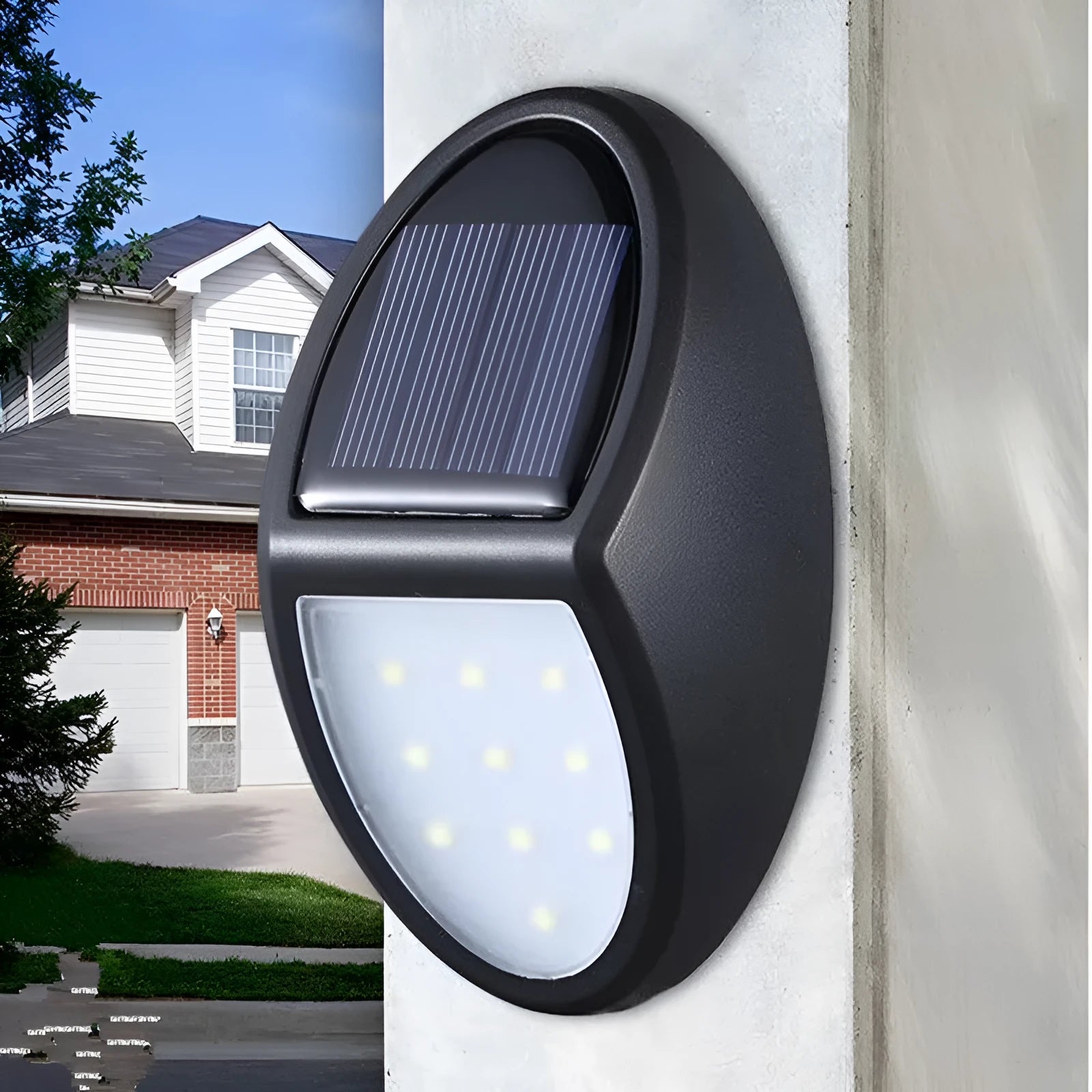 Black rectangular solar-powered LED wall light with solar panel on top.
