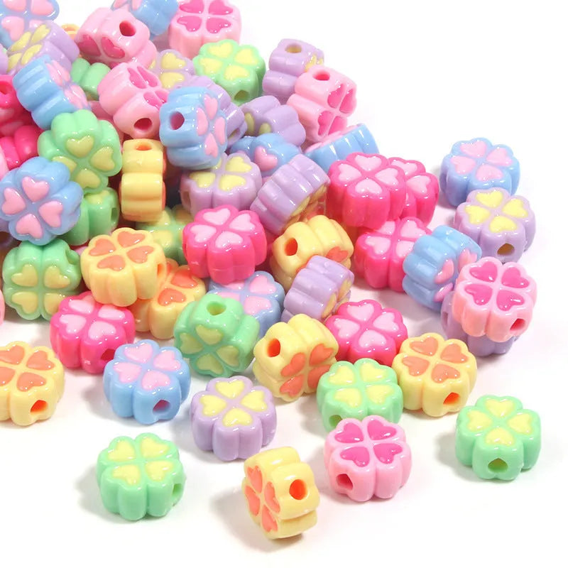 15mm acrylic clover beads with cartoon love pattern and frosted finish in mixed colours