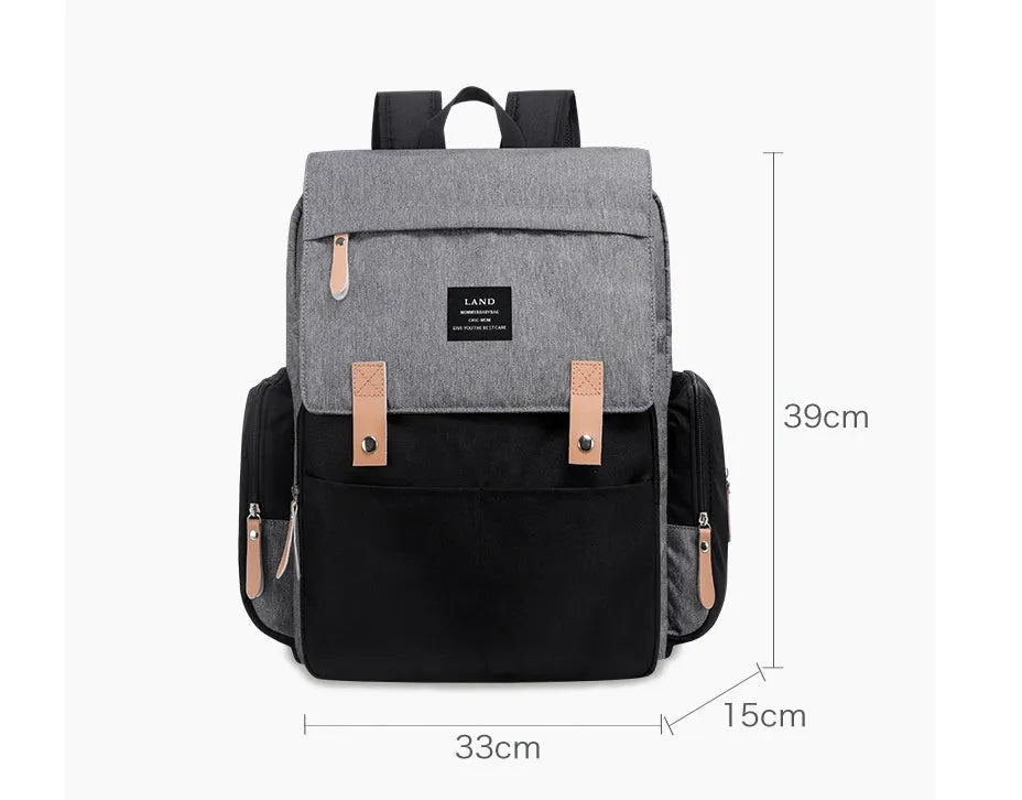 LAND Mommy large oxford cloth diaper backpack with changing mat in beige colour.