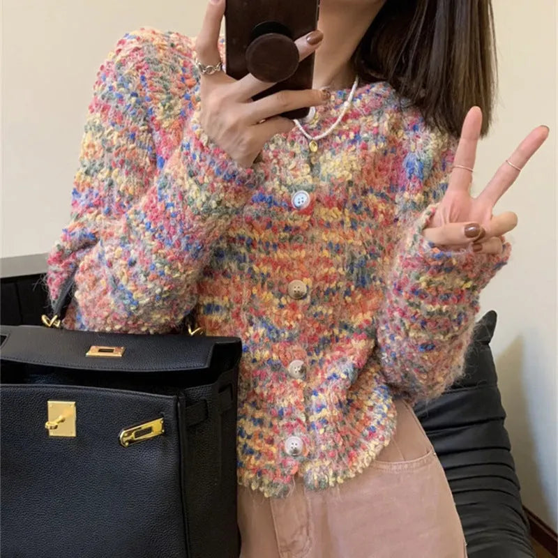 Retro style knitted rainbow cardigan sweater in pink or green colour with toothbrush hair fabric texture