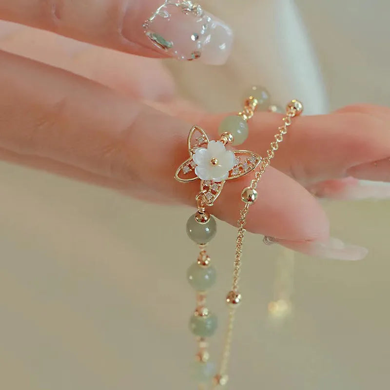 Yellow gold shell flower butterfly bracelet for women with geometry shape and electroplated finish