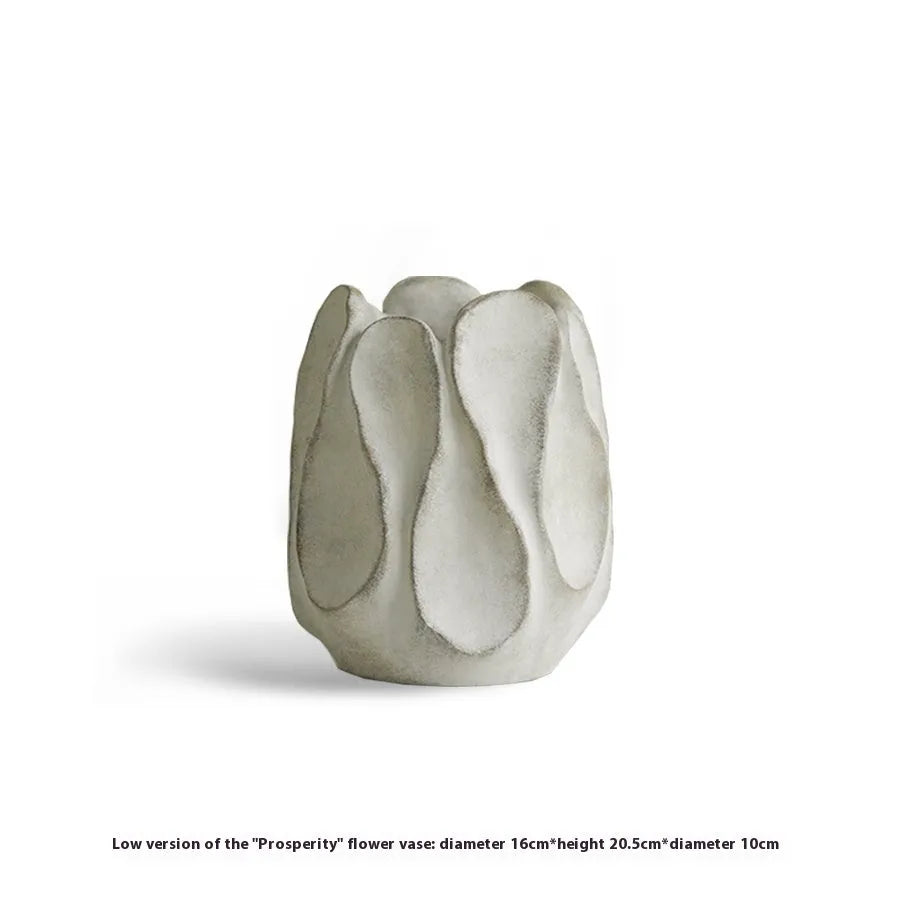 Irregular ceramic vase for flower arrangements in magnesium clay with natural textured finish