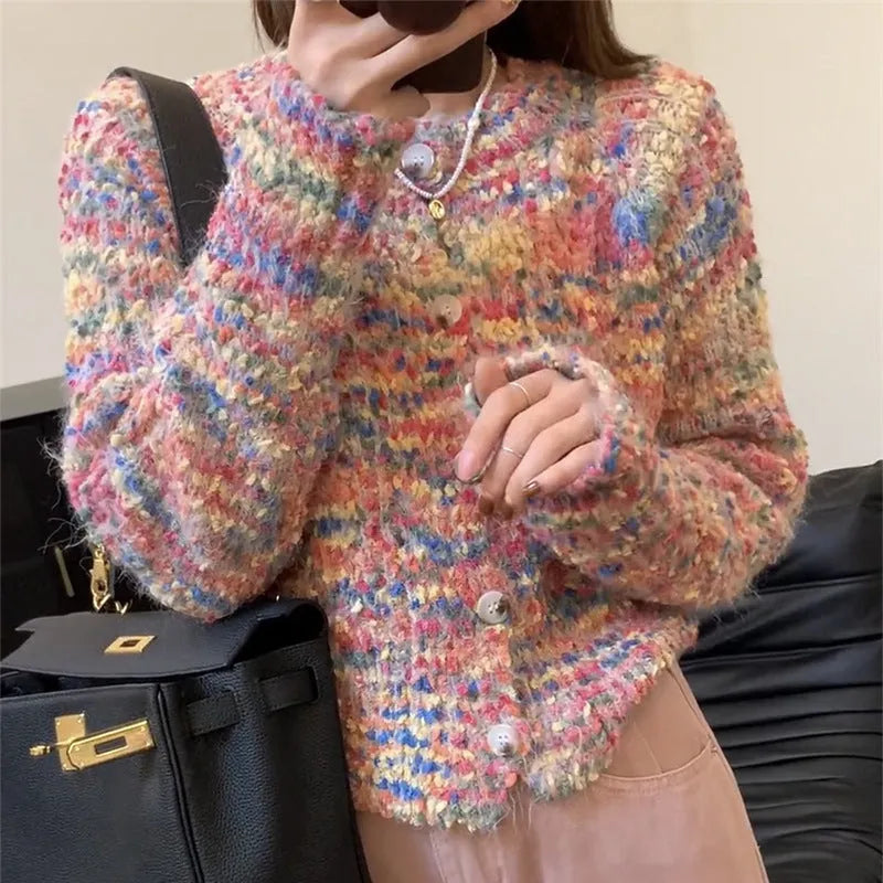 Retro style knitted rainbow cardigan sweater in pink or green colour with toothbrush hair fabric texture