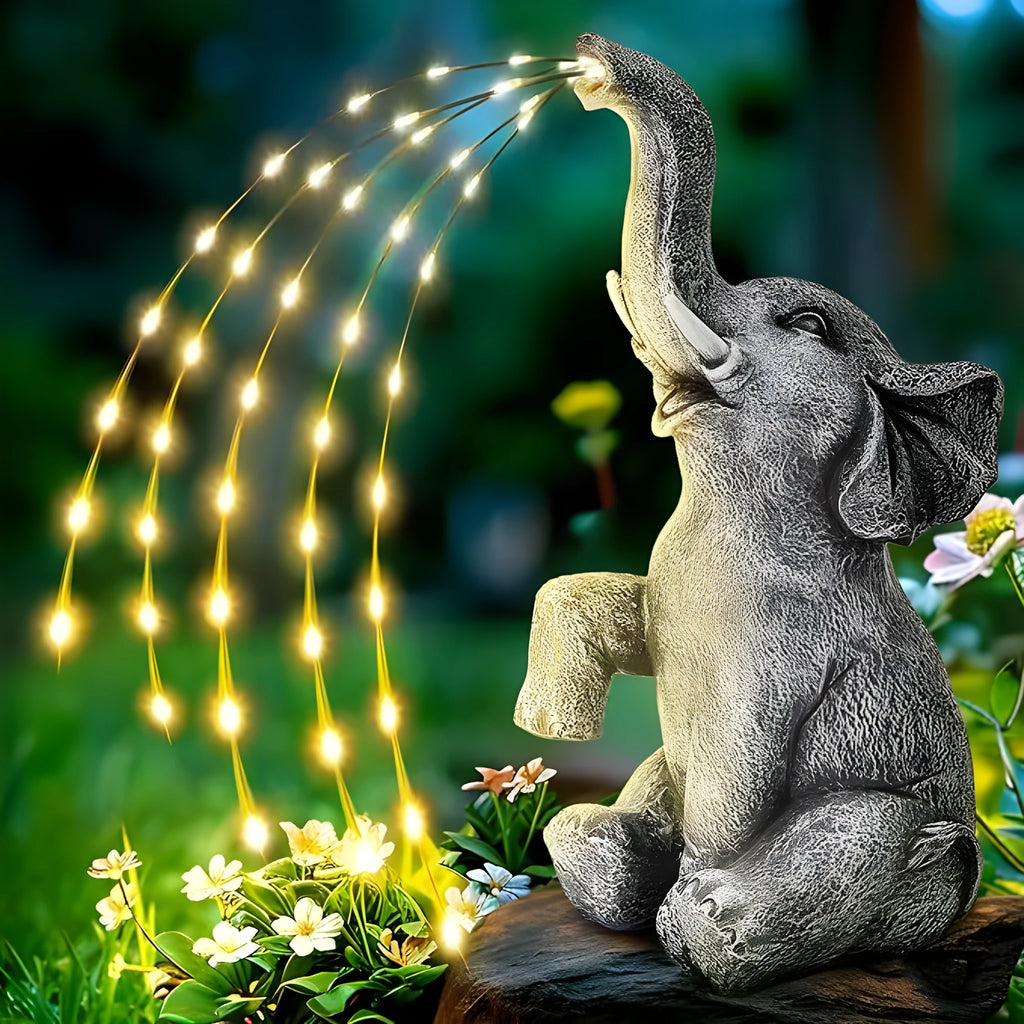 Elephant resin garden sculpture with integrated LED lighting, suitable for outdoor or indoor decorative use