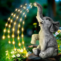 Elephant resin garden sculpture with integrated LED lighting, suitable for outdoor or indoor decorative use