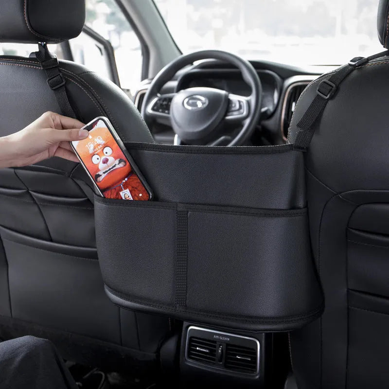 Black leather car seat storage bag with sports carbon fibre pattern measuring 38cm