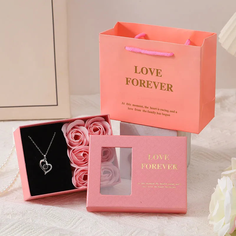 Korean style soap flower gift box set with six roses, presentation box, and handbag in red, pink, or black.