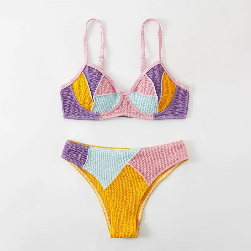 Ladies splicing colour bikini set with steel bracket push-up top and high-waisted shorts on a mannequin.
