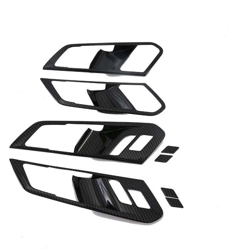 Black ABS plastic centre console trim panel for BMW X5 2019 G05 model with integrated cup holders.