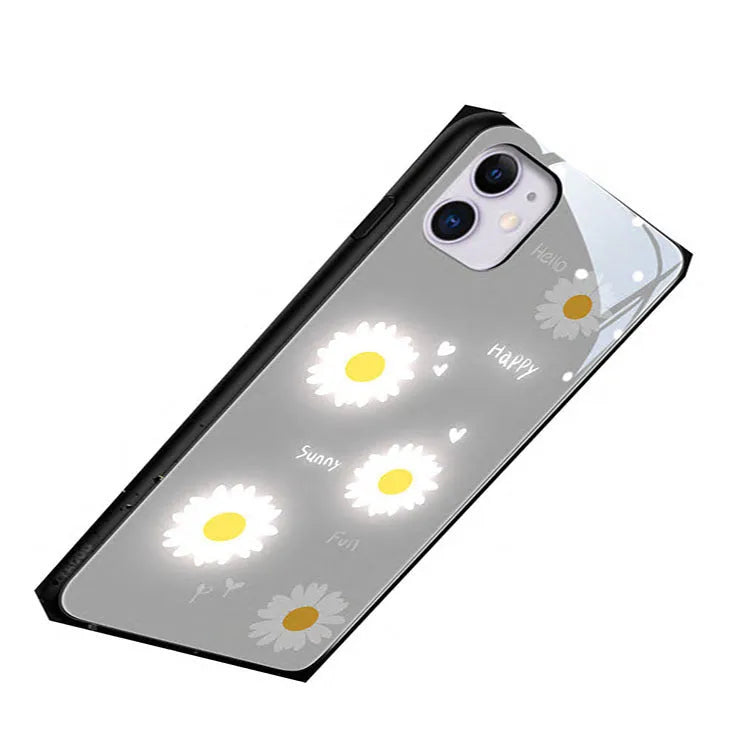 iPhone case with TPU protective shell showing daisy painted design and voice-activated colour light feature