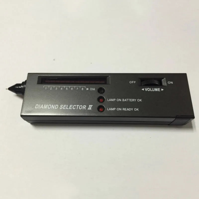 Black portable thermal conductivity meter for diamond testing with metal probe, showing dimensions.