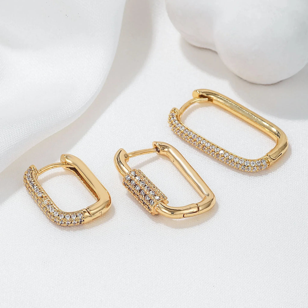 Three geometric ear clips with micro inlaid zircon stones in gold and white colour options