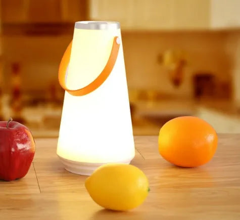 White rechargeable LED bedside lamp with USB charging cable showing dimensions 12x12x22cm