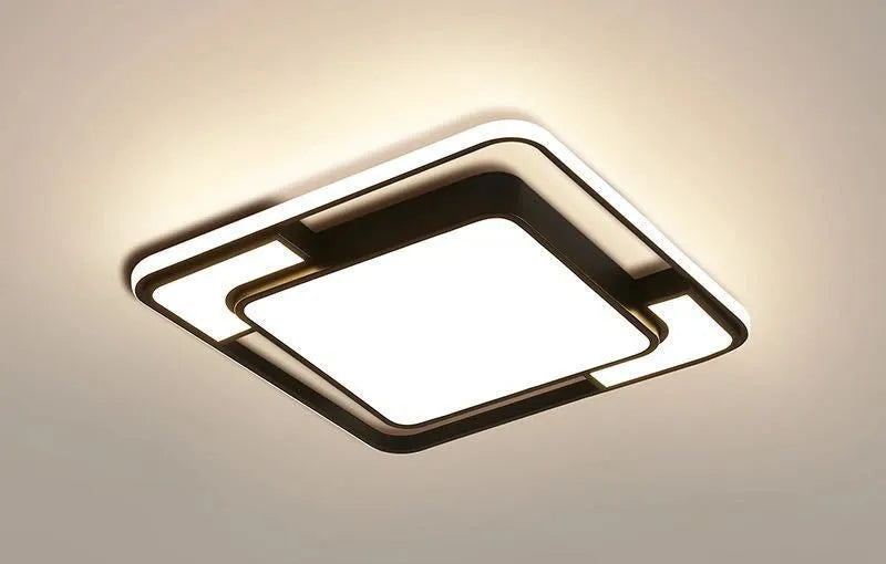 White square LED ceiling lamp with a flush mount design for living room or bedroom.