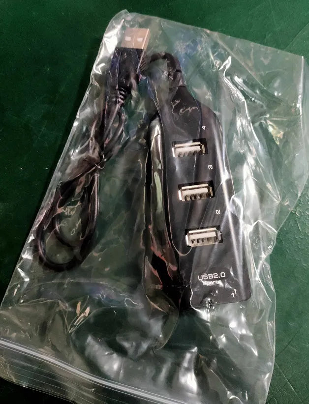 Super ConsoleX wired USB game controller with Snes handle design on black background