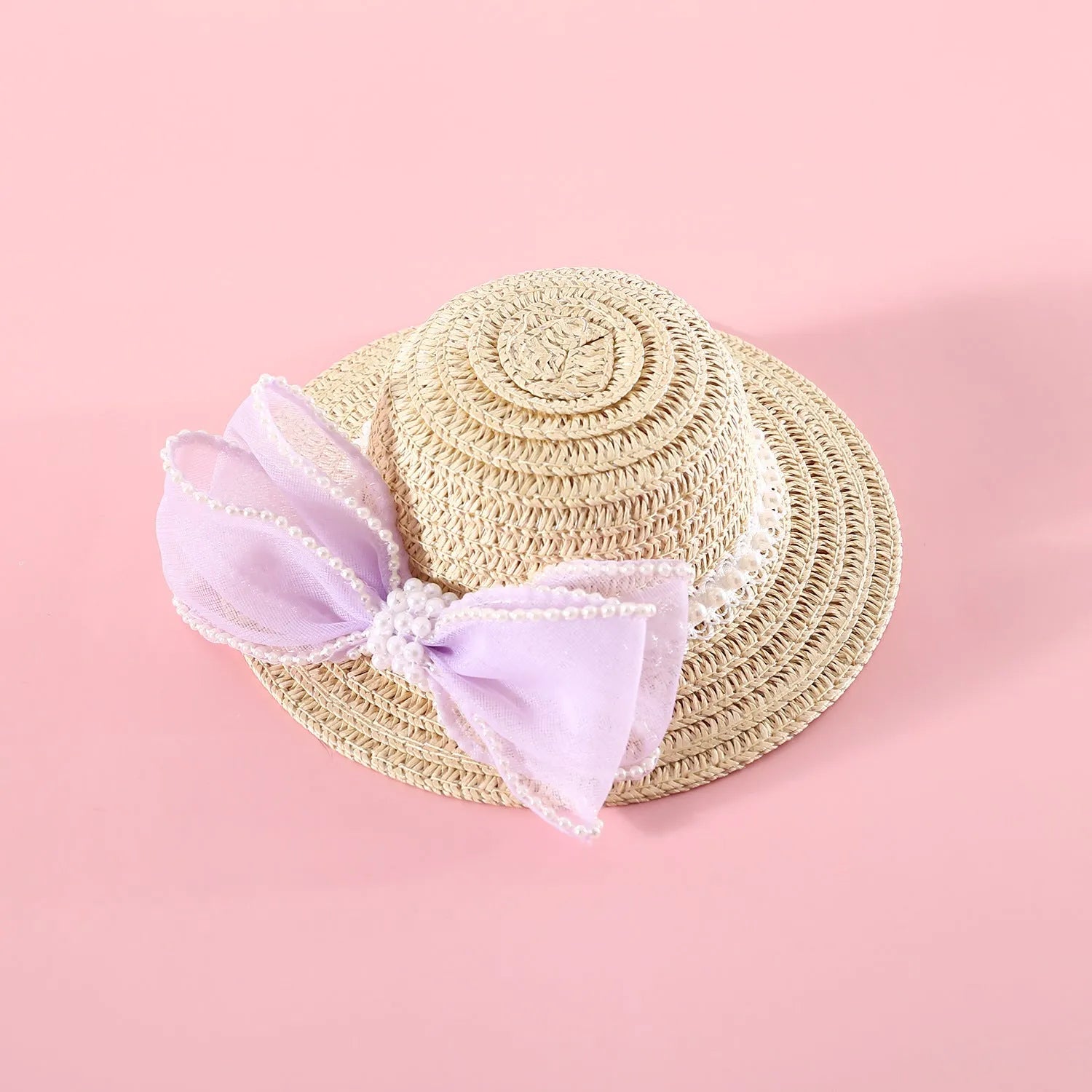 Woven Lafite leaf cat hat with pearl bow decoration in butterfly design