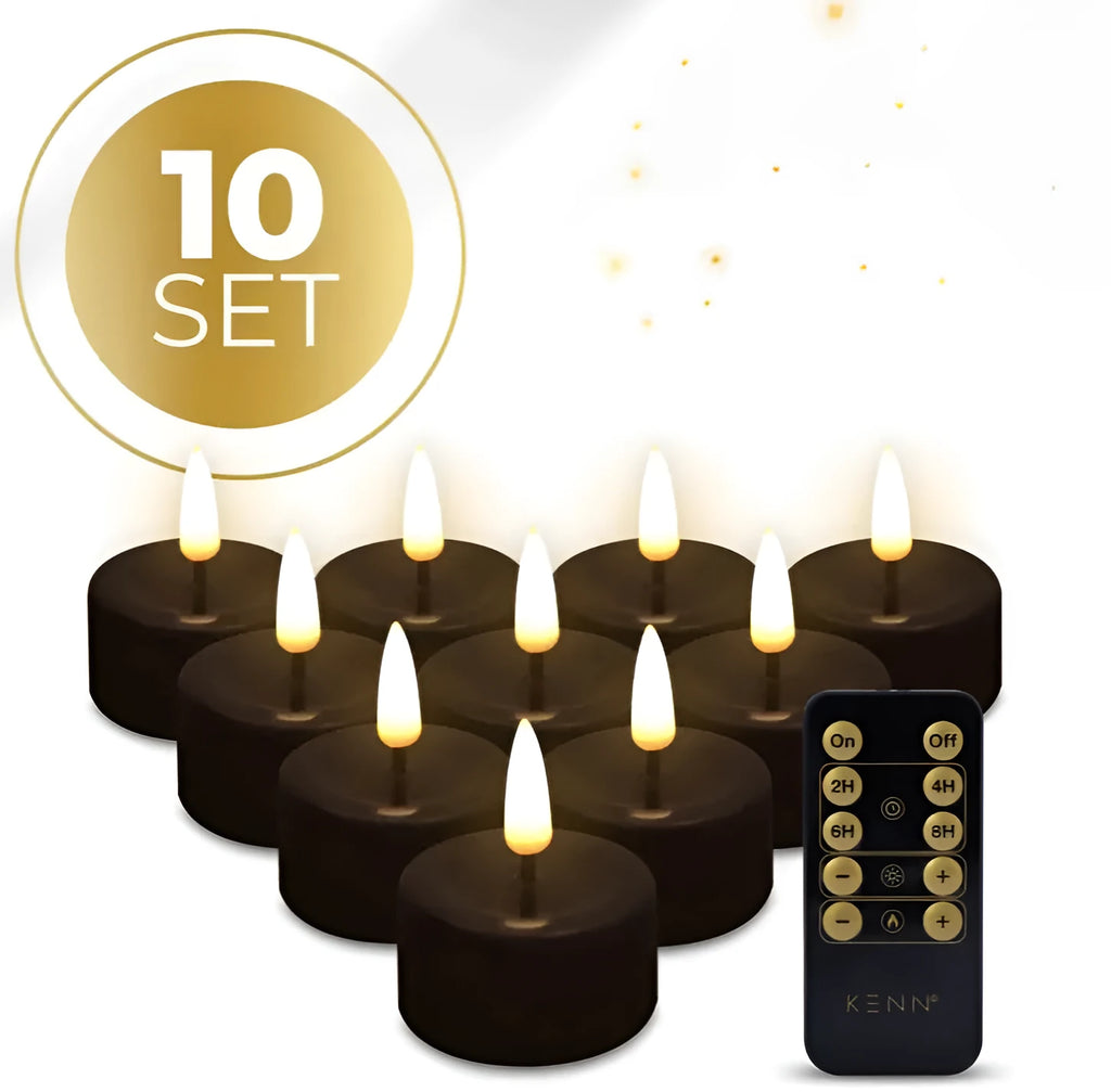 Four black S10 LED flameless tealight candles on a table.