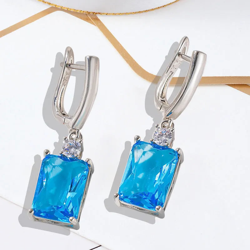 Copper geometric square earrings with electroplated gold or silver finish, quadrilateral design