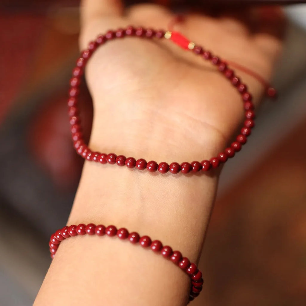 Handcrafted natural cinnabar bracelet with purple gold sand geometric design and auspicious Chinese patterns