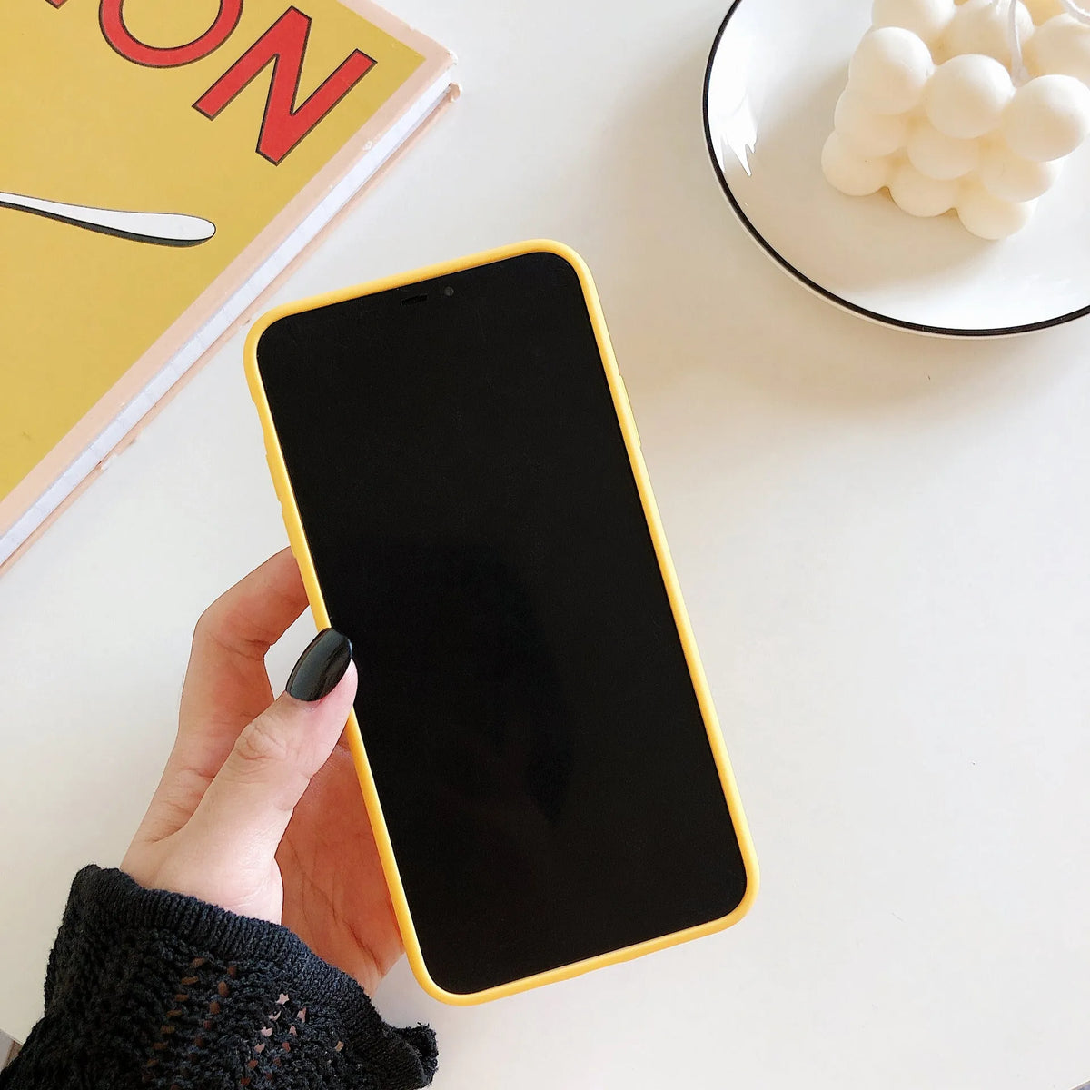 IMD solid colour iPhone case featuring a large open banana graphic, compatible with multiple iPhone models.