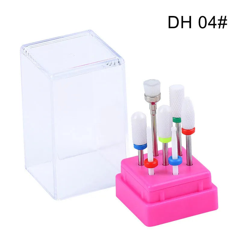 Tungsten steel nail drill polishing head set with six bits and a brush in a transparent case.