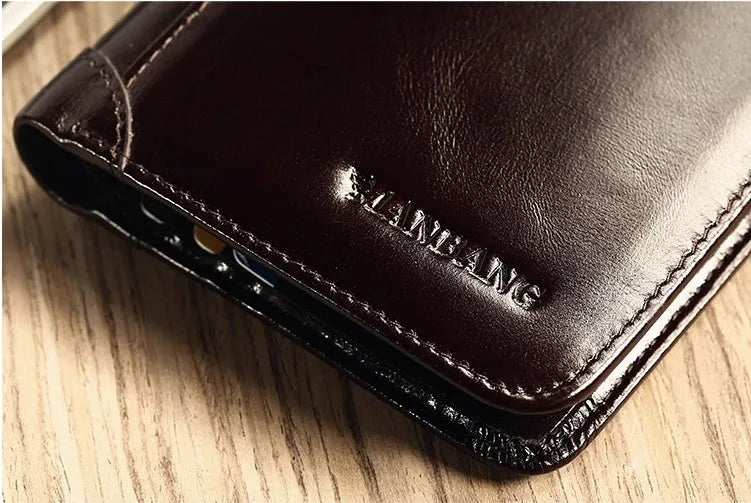Men's leather organiser wallet open to show internal compartments including card slots and a zipped coin pocket.