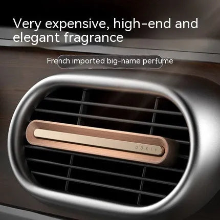 Long strip solid car aromatherapy ornament in vent, shown in walnut and metallic grey colours.