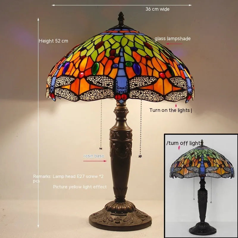 Stone table lamp with Tiffany-style blue dragonfly design on base