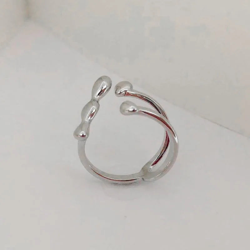 Brass opening ring with sphere circle detail in gold colour, adjustable women's fashion jewellery