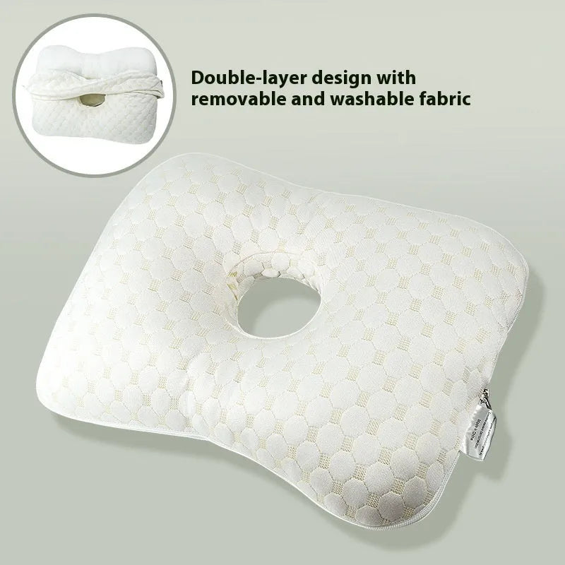 Beauty salon single hole ear pillow for adults in grey colour on a treatment bed.