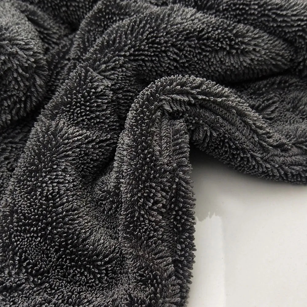Grey 40x40 centimetre microfiber car wash and drying towel laid flat