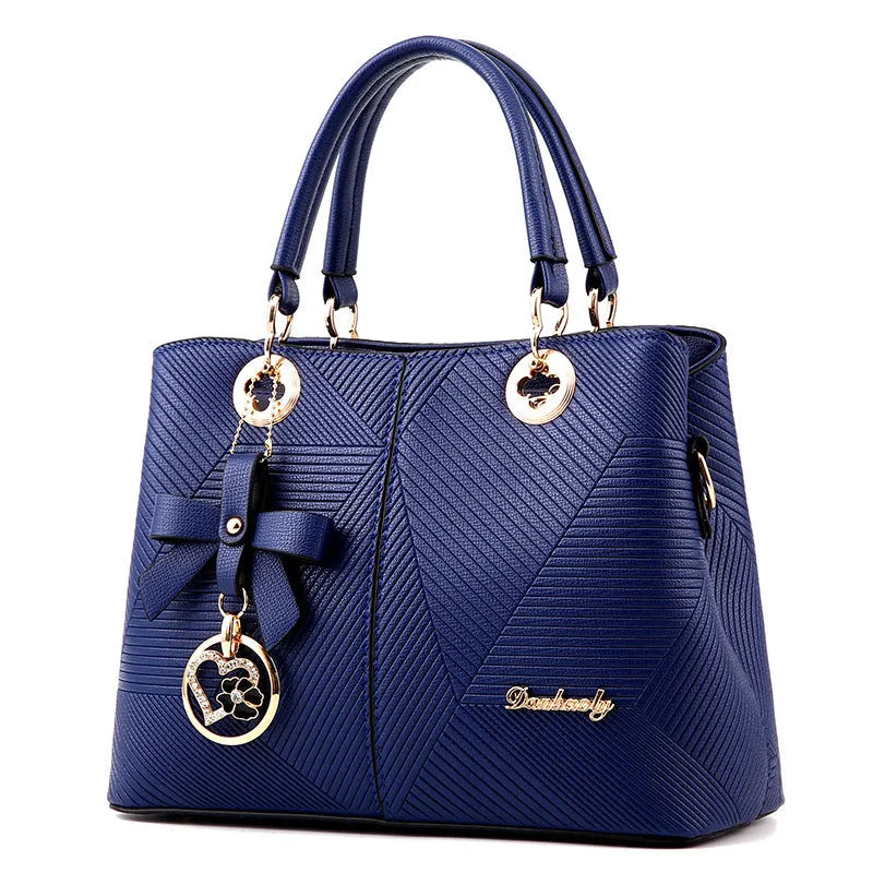 Retro PU leather handbag with shoulder strap and zipper closure in multiple colour options