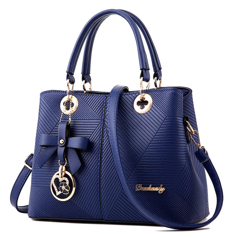 Retro PU leather handbag with shoulder strap and zipper closure in multiple colour options