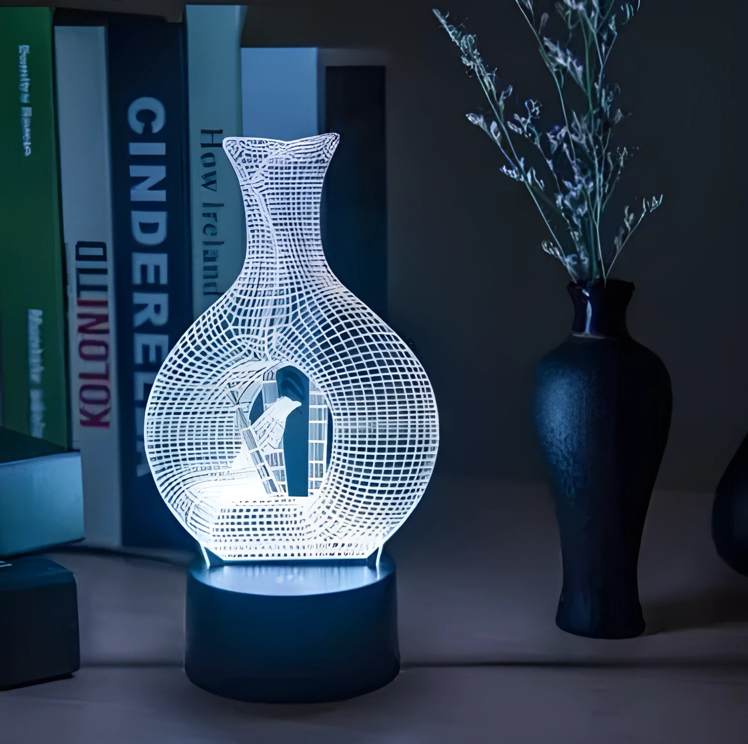 3D acrylic LED night light with ABS base showing colour changing illumination
