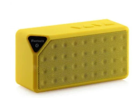 Cannon X3 small cube-shaped portable Bluetooth speaker in black, blue, green, red, and yellow colour options