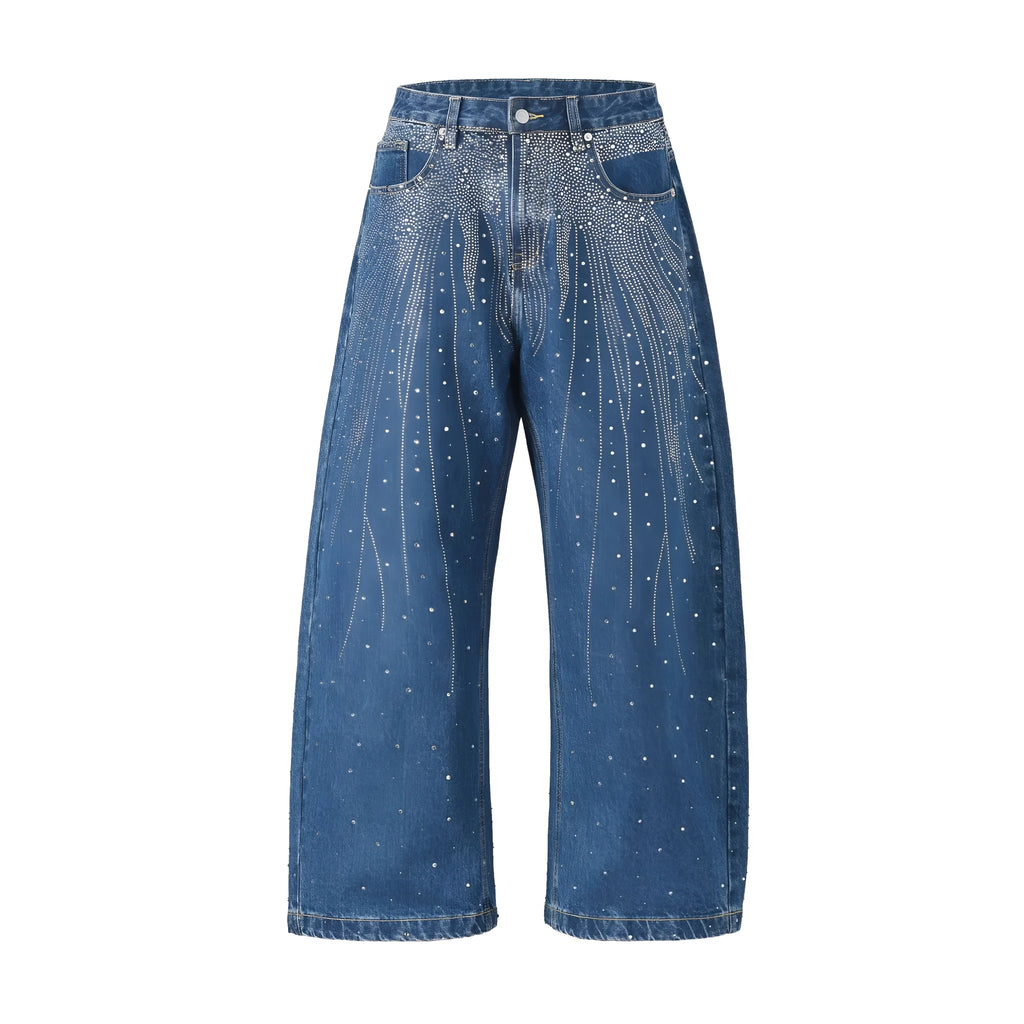 Blue loose-fitting wide-leg cotton trousers laid flat, showing the high street casual style.