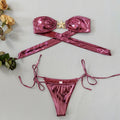 Women's glossy tube top bikini set with gold starfish design in sapphire blue