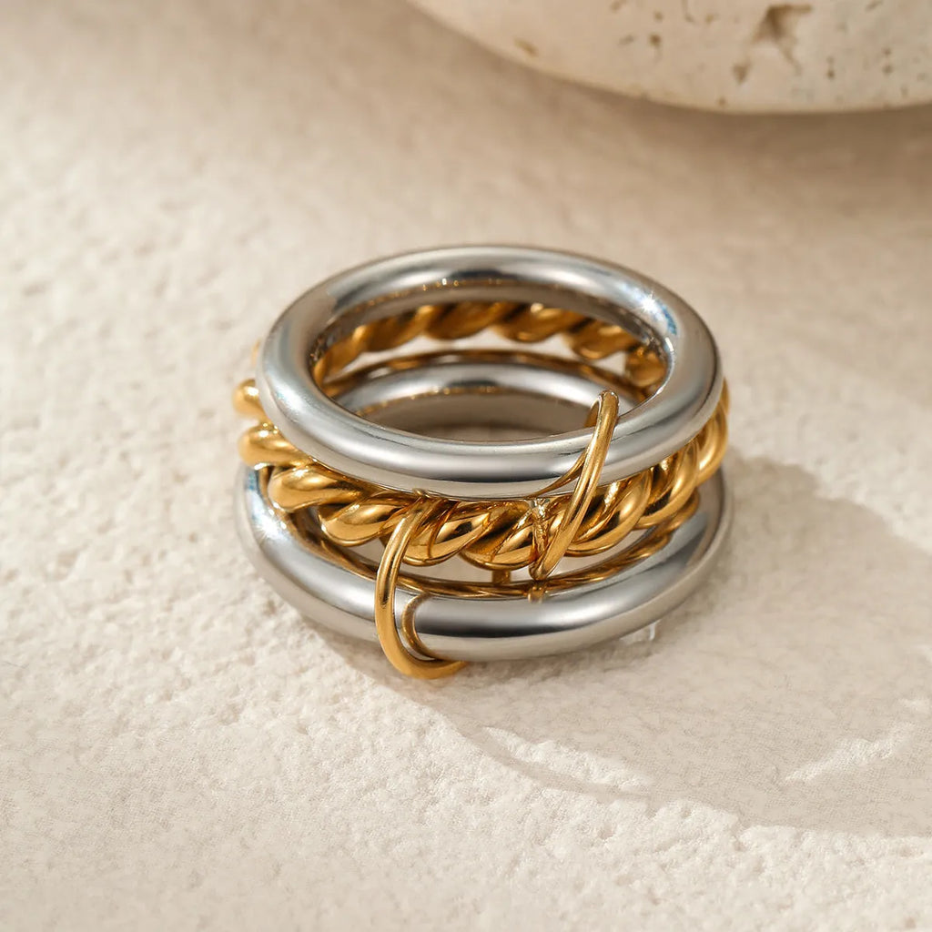 Stacked colour matching stainless steel ring set with 18K gold plating