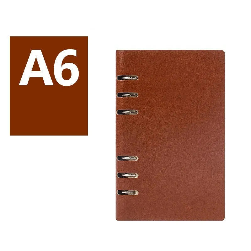 Loose-leaf business notebook in seaweed green imitation leather cover showing A5 size with beige paper