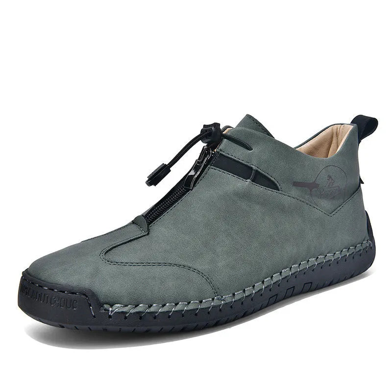 Men's black casual leather shoes with a round toe, rubber sole, and mid-height heel.