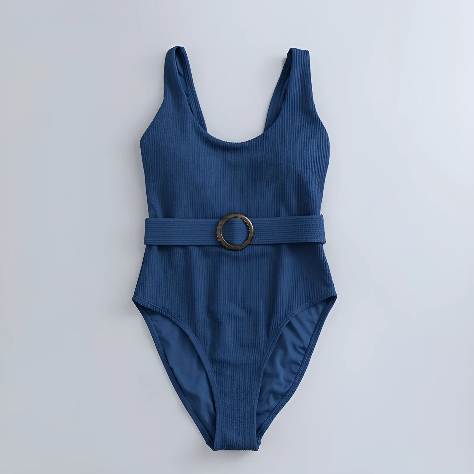 Navy blue women's one-piece swimsuit with triangle design and chest pads